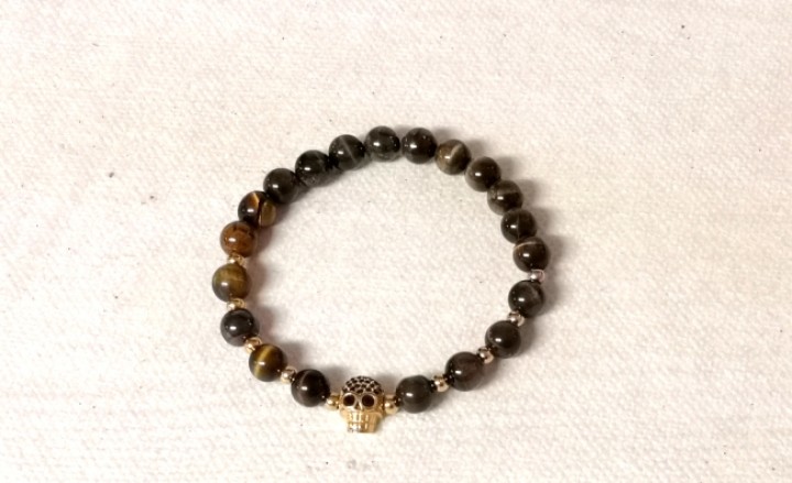 Maholiss - <p><em><strong>Modisches Tigerauge Armband mit</strong> <strong>Edelstahlkopf</strong></em></p><p><strong>Länge:</strong> ca.18 cm<strong> Perlen:</strong> 8mm</p><p><em><strong>Steinschmuck ist nicht nur ein modischer Hingucker sondern gibt auch sehr positive Schwingungen an unseren Körper ab.<br />So können sie nicht nur ihre Äußere Schönheit betonen, sondern auch ihrer Seele was Gutes tun.</strong></em></p><p>Bei allen Handgefertigten Schmuckstücken werden nur Ausgewählte Qualitätsprodukte verwendet,<br />und in eigener Werkstatt hergestellt.</p>